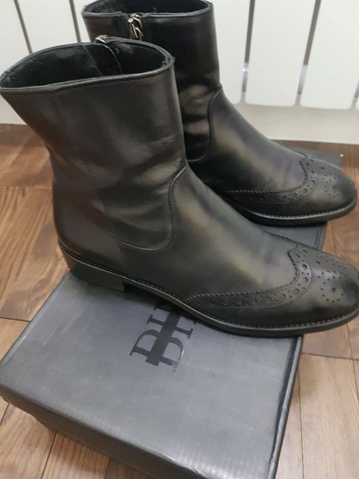 Продам осенние кожанные сапоги 36 размера Италия