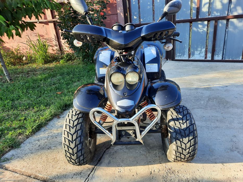 Vand ATV DEFENDER 50 impecabil la SUPER PRET!