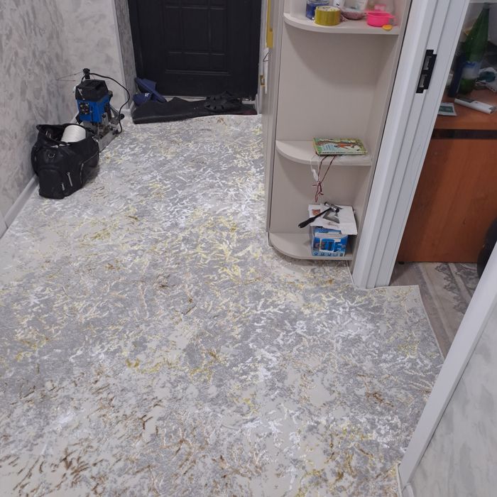 Gilam kesish va tikish