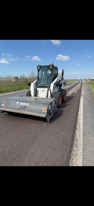 Bobcat Miniincarcator 2.5t/3.5t de inchirat perie asfalt,lame paleti,cupa