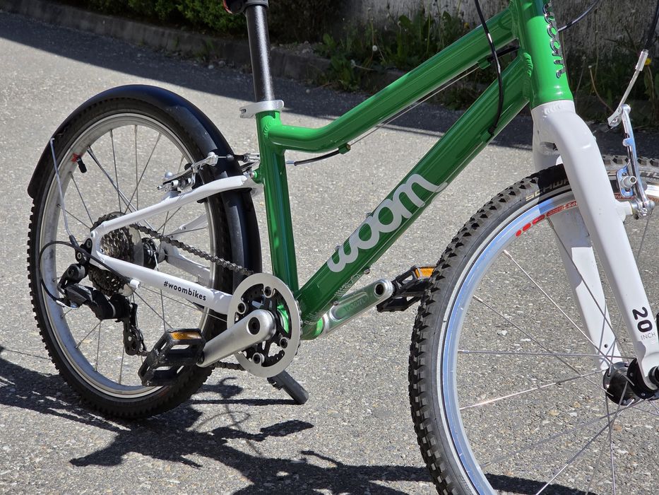 Vand bicicleta WOOM 4 (20") second-hand, verde