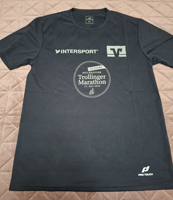 Tricouri noi M, INTERSPORT  4 bucăți 20 lei