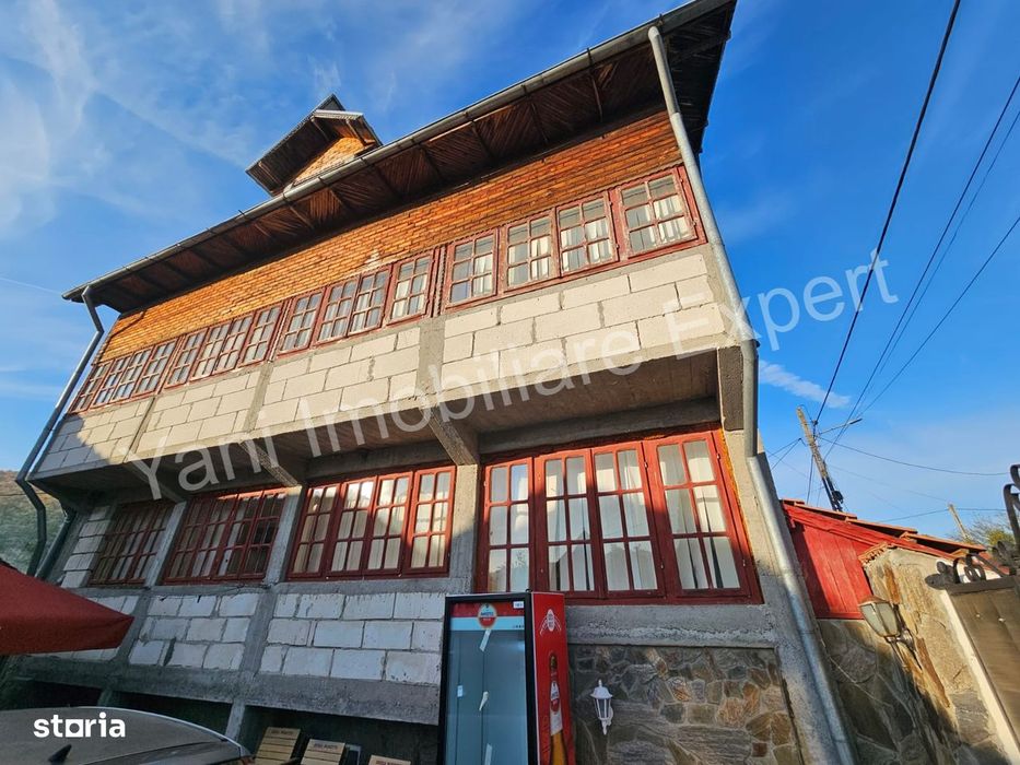 Casă + spațiu comercial de vânzare în comuna Băiculești, județ Argeș.