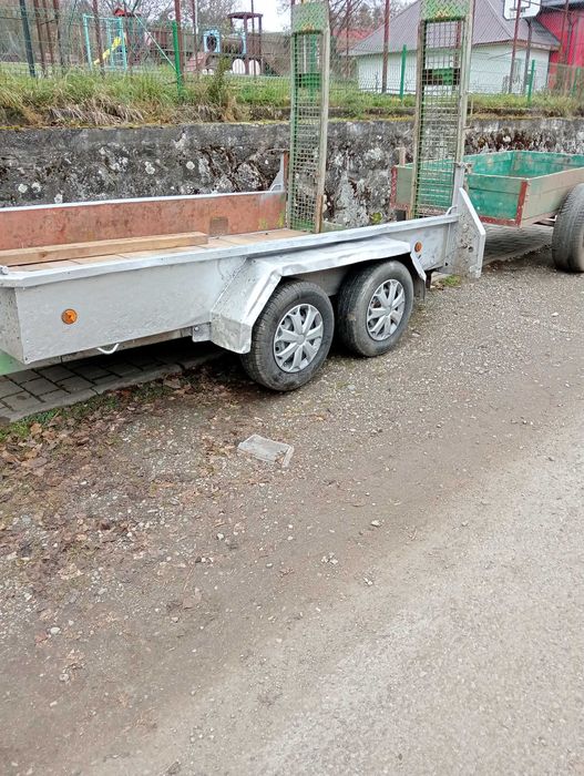 Remorca transport utilaje cu rampe.