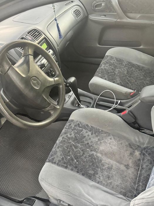 Машина мазда 323 F