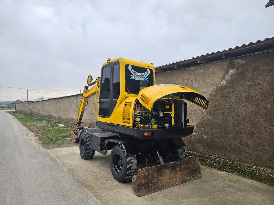 Колёсный экскаватор