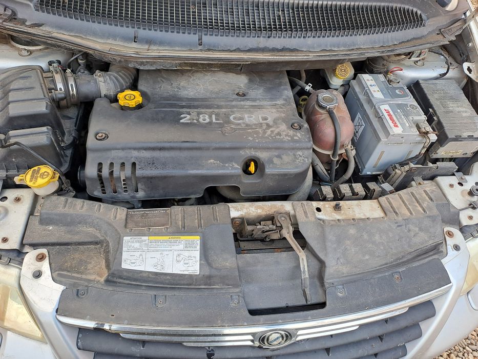 Vînd Chrysler Grand Voyager