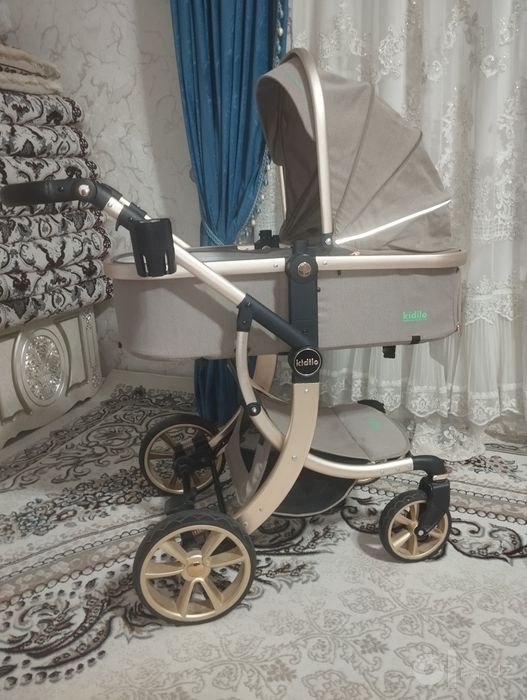 Bolalar kolyaskasi kidilo