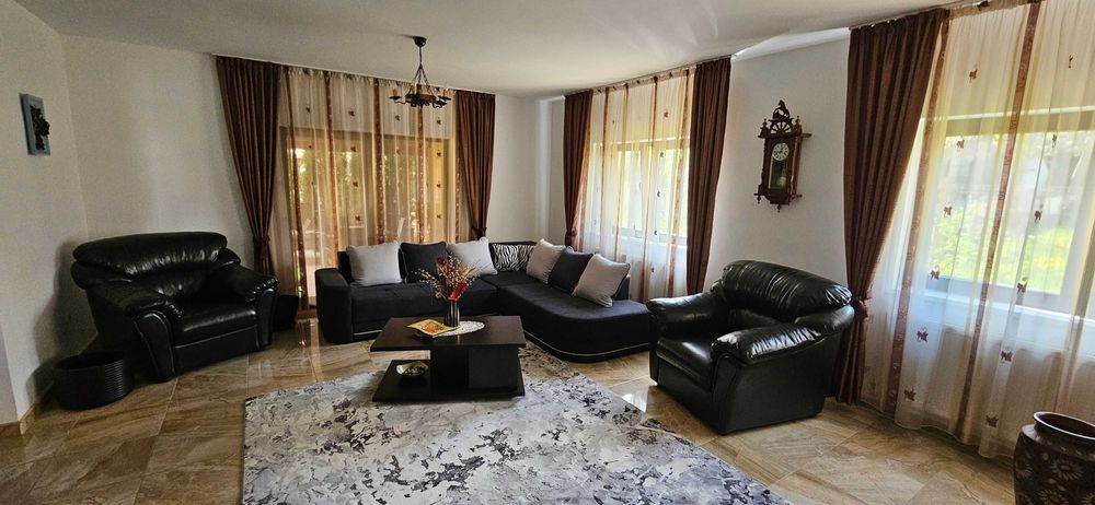 Casa de vanzare cu gradina.