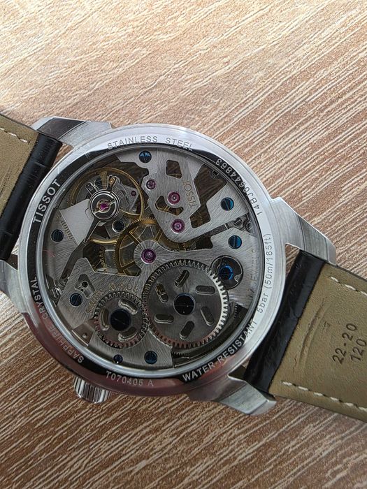 Часовник TISSOT SKELETON  T070405A