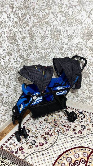 Коляска егіздерге сатылады