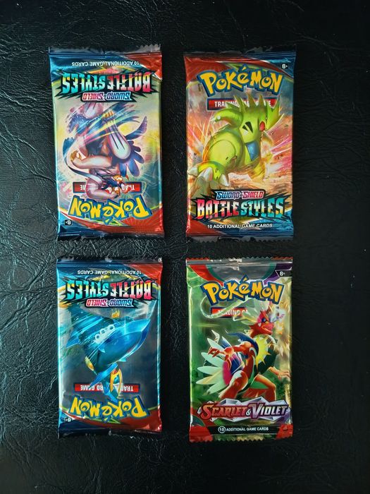 4 Pachete de carti pokemon sigilate.