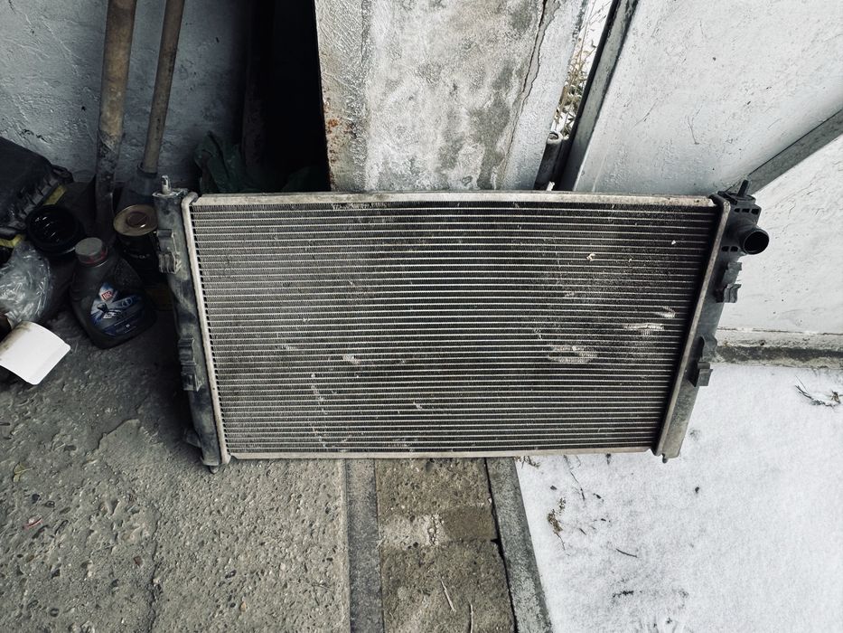 Продам  радиатор mitsubishi outlender