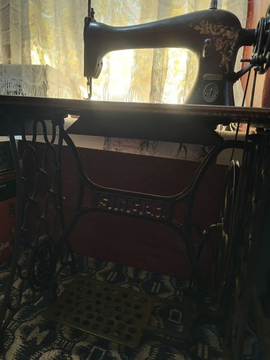 Mașină de cusut Singer
