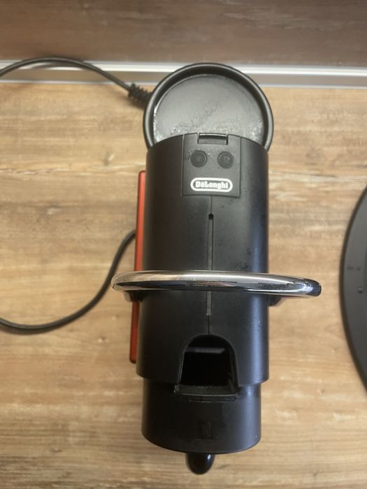 Кафемашина с капсули Delonghi
