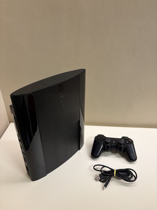 PS3 SuperSlim modat 10 jocuri