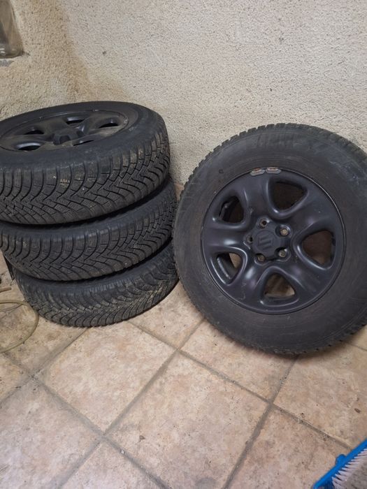 Set roti complete compatibile cu Suzuki Grand Vitara cu anvelope de iarna  Falken Eurowinter215/70/16