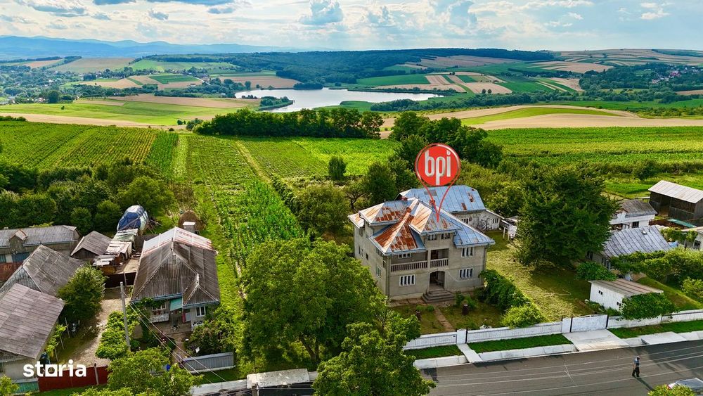 SE VINDE VILA cu 12 cam. “la gri” cu peste 40ari teren in Forasti, SV