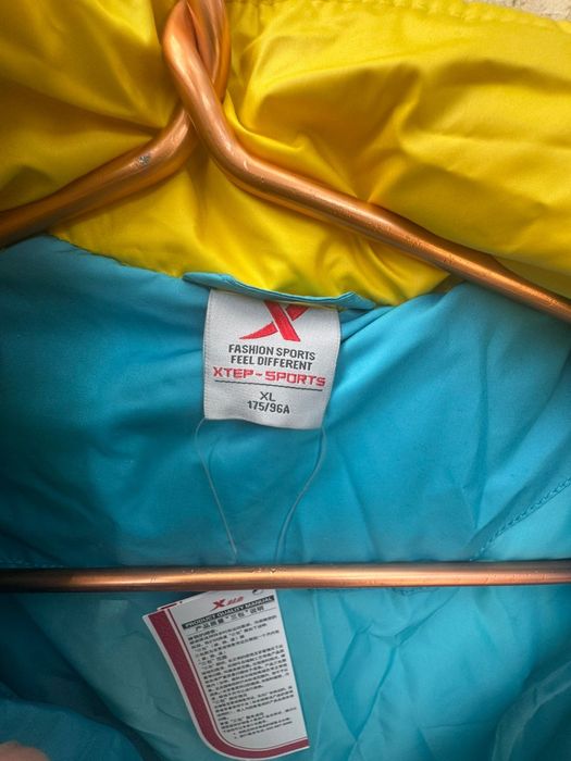 Продам пуховик мужской новый