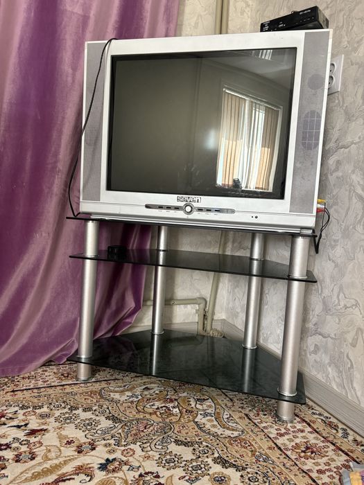 Телевизор, подставкасымен Seven.