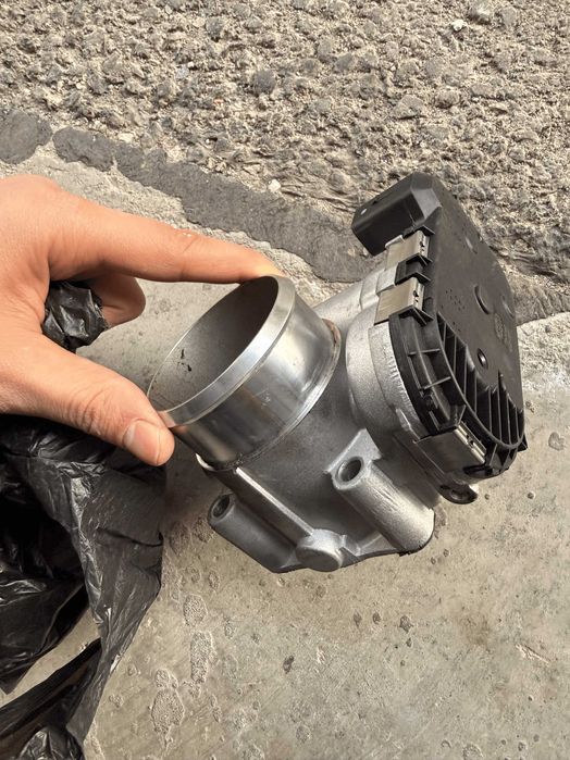 Дроселовата клапа  MAGNETI MARELLI Audi A4 B6 бензин