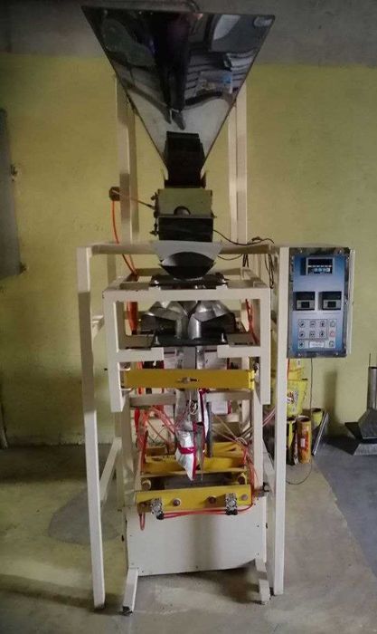 Упаковочный фасовочный автомат, для сыпучих  с весовым дозатором