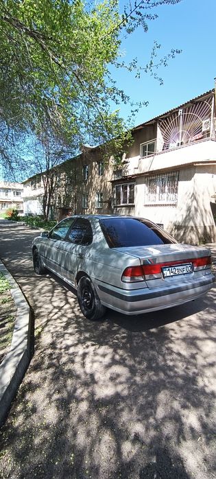 Автомобиль Nissan b15