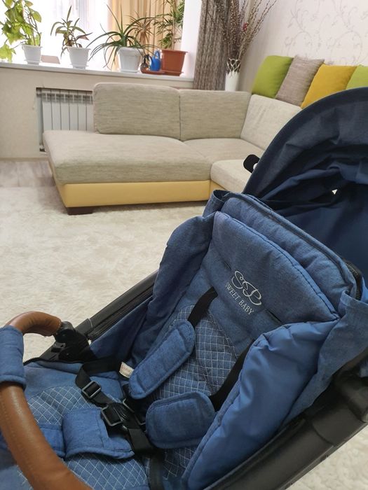 Детская прогулочная коляска