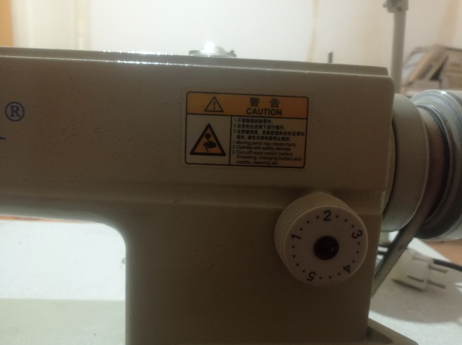 Промышленную машинку б/у