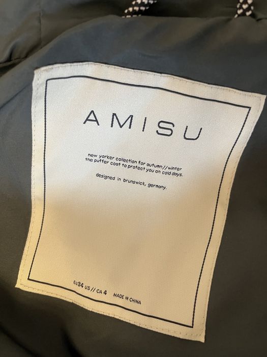 Продам демисезонный пуховик