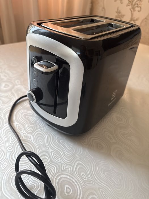 Продам тостер Electrolux