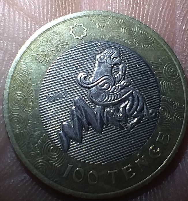 Сто тенге крылатый барс