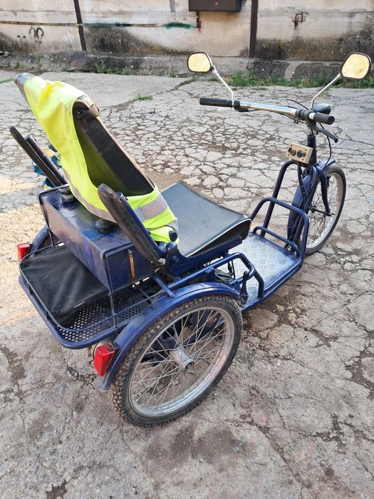 Schimb triciclu pe benzină cu triciclu electric