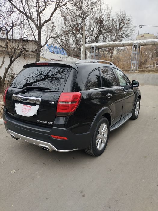 Captiva 3 Avtomat rangi qora benzinda yurilgan xolati butun.