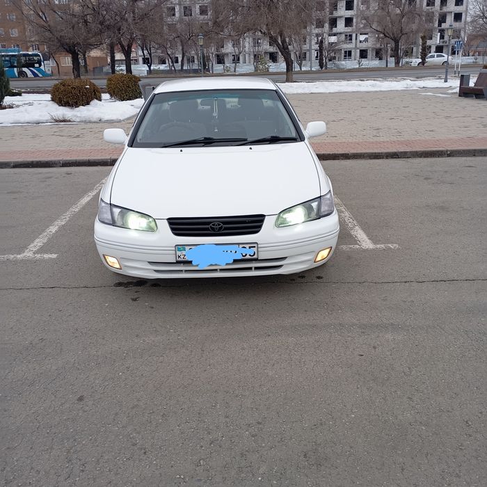 Тайота камрй грация