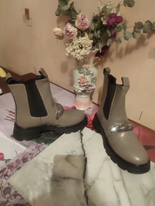 Продам новые сапоги