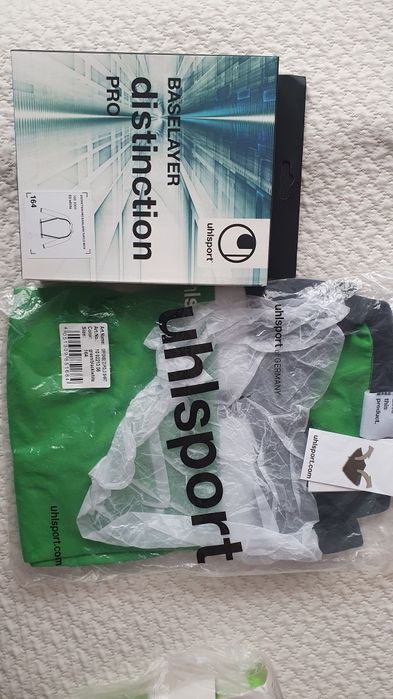 Юношески спортни дрехи uhlsport