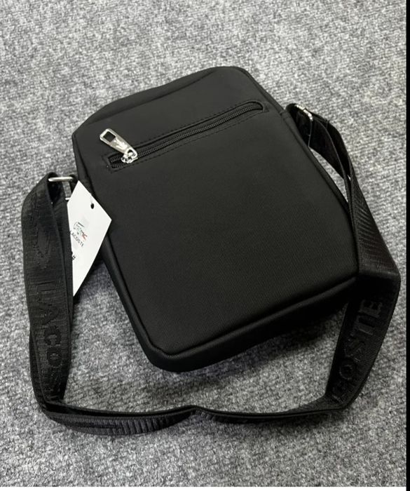 Барсетка от бренда Lacoste