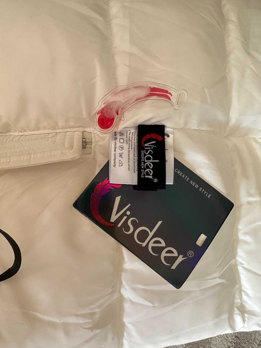 Пуховик немецкий новый