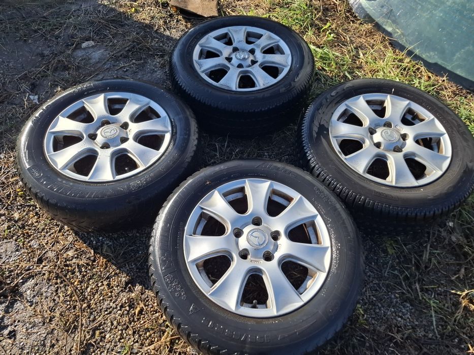Jante magneziu mazda 3  /195/65/15 cu cauciucuri M&S