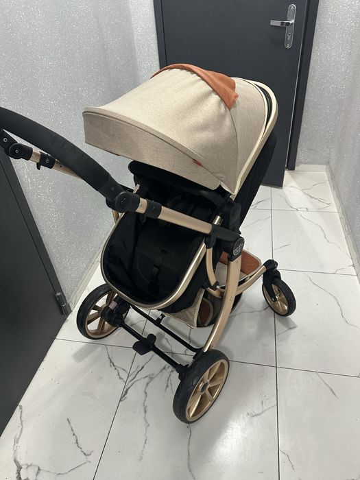 Детская коляска 2 в 1 (прогулочная и люлька)