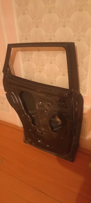 Двер shevrolet tracer