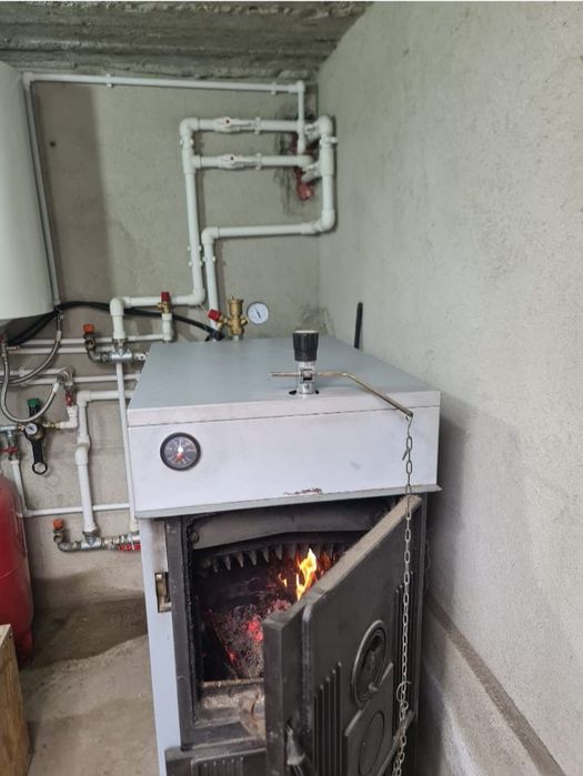 Vând centrală fontă 32kw