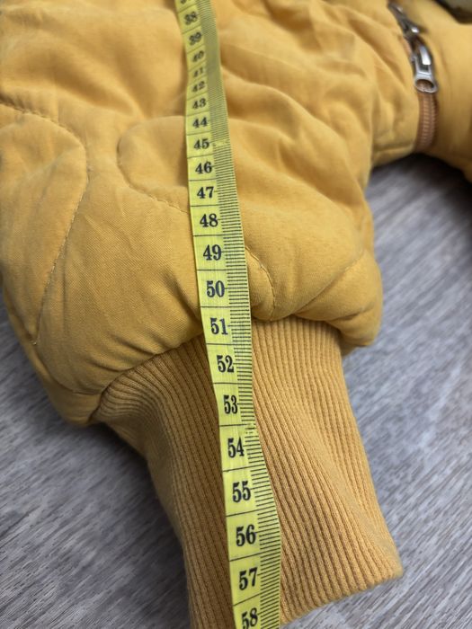 Зимние комбинезоны