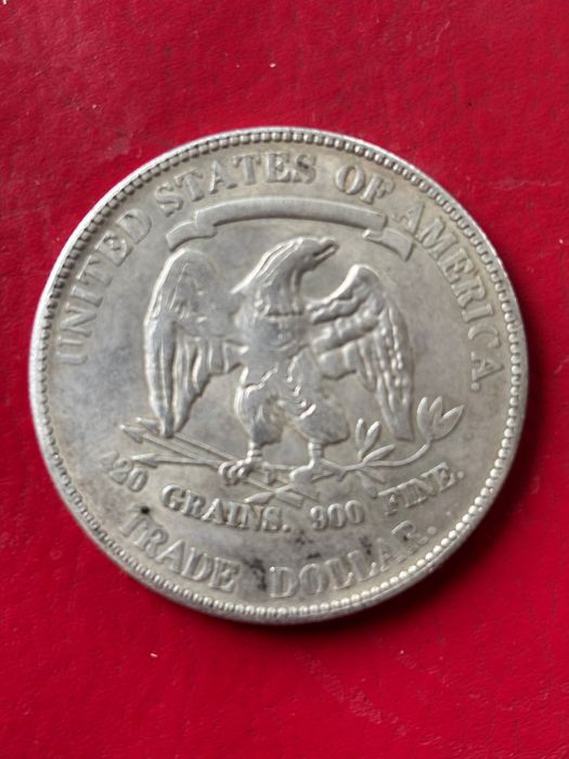 Монета one dollar