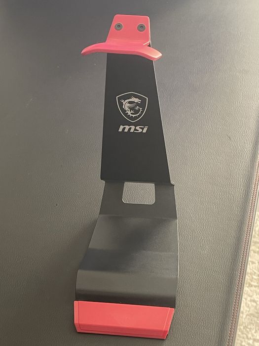 Поставка за слушалки