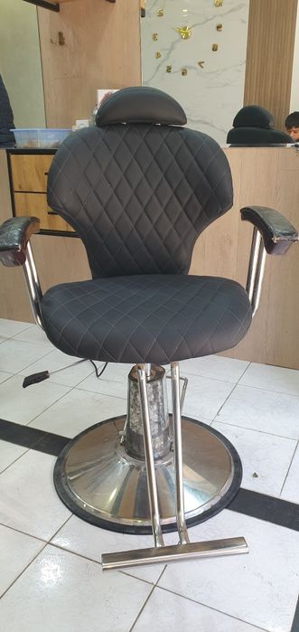 Парикмахерская кресло