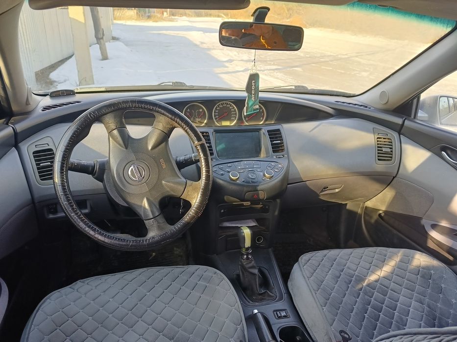 Продам нисан п12