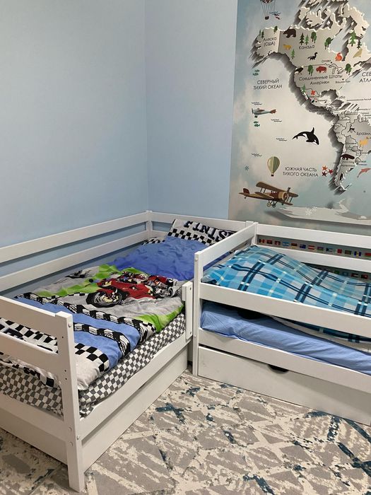 Детская кровать с выдвижными ящиками