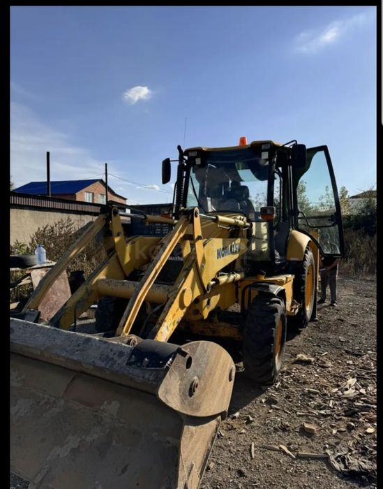 Услуги экскаватора-погрузчика